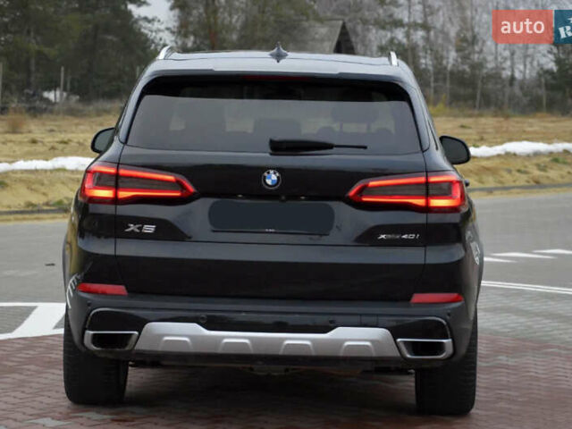 Чорний БМВ Х5, об'ємом двигуна 3 л та пробігом 63 тис. км за 18400 $, фото 6 на Automoto.ua