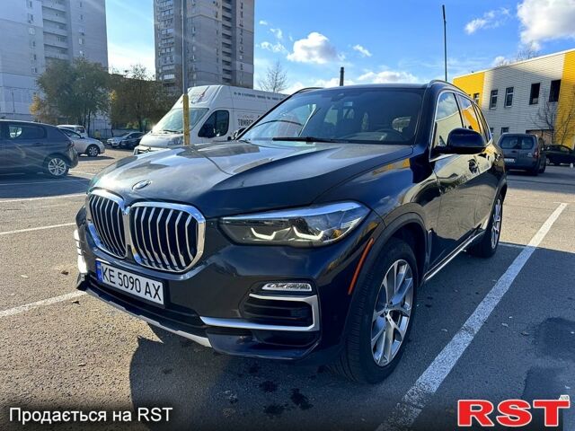 Черный БМВ Х5, объемом двигателя 3 л и пробегом 54 тыс. км за 51500 $, фото 1 на Automoto.ua