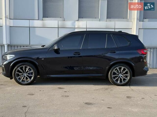 Черный БМВ Х5, объемом двигателя 3 л и пробегом 104 тыс. км за 57902 $, фото 2 на Automoto.ua