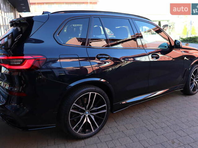 Чорний БМВ Х5, об'ємом двигуна 3 л та пробігом 180 тис. км за 56900 $, фото 2 на Automoto.ua