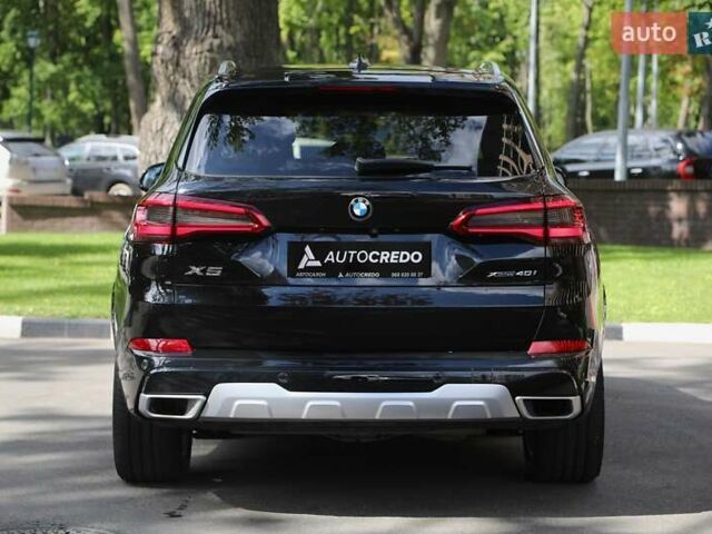 Чорний БМВ Х5, об'ємом двигуна 3 л та пробігом 100 тис. км за 52000 $, фото 4 на Automoto.ua