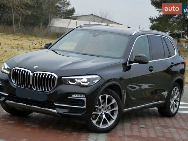 Чорний БМВ Х5, об'ємом двигуна 3 л та пробігом 63 тис. км за 18400 $, фото 1 на Automoto.ua