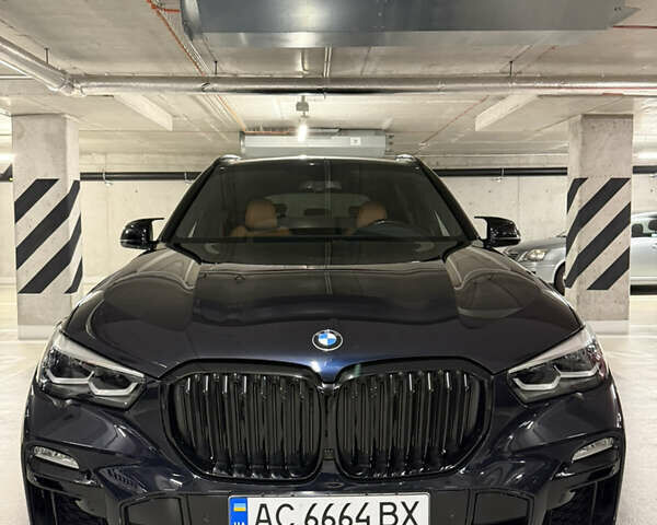 Чорний БМВ Х5, об'ємом двигуна 3 л та пробігом 107 тис. км за 63999 $, фото 1 на Automoto.ua