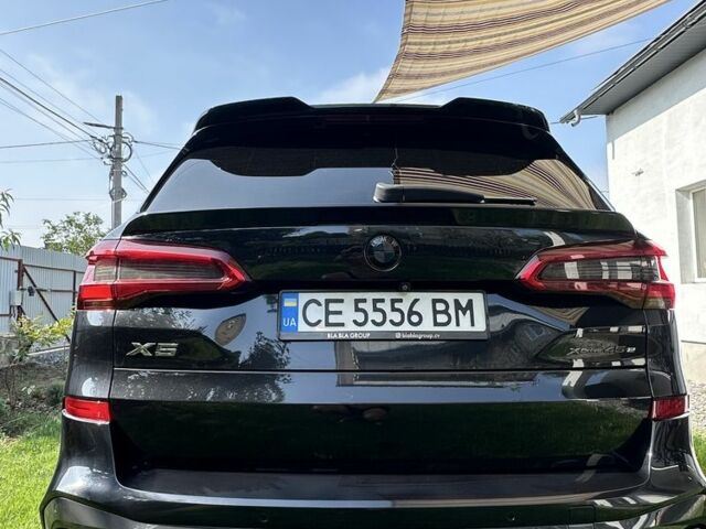 Чорний БМВ Х5, об'ємом двигуна 3 л та пробігом 110 тис. км за 65900 $, фото 1 на Automoto.ua
