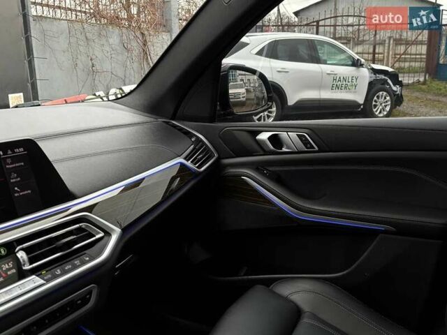 Черный БМВ Х5, объемом двигателя 3 л и пробегом 175 тыс. км за 41500 $, фото 58 на Automoto.ua