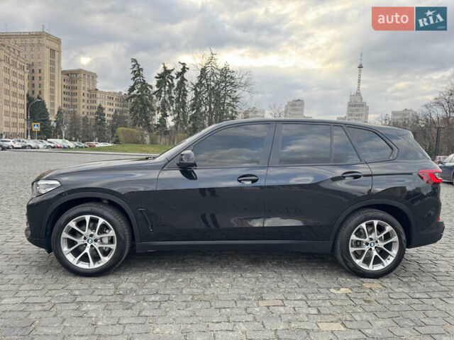 Черный БМВ Х5, объемом двигателя 3 л и пробегом 150 тыс. км за 48000 $, фото 2 на Automoto.ua