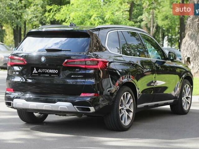 Чорний БМВ Х5, об'ємом двигуна 3 л та пробігом 100 тис. км за 52000 $, фото 3 на Automoto.ua