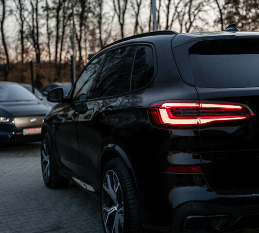 Чорний БМВ Х5, об'ємом двигуна 2.99 л та пробігом 124 тис. км за 64990 $, фото 2 на Automoto.ua