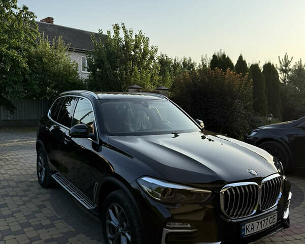 Черный БМВ Х5, объемом двигателя 2.99 л и пробегом 74 тыс. км за 63000 $, фото 1 на Automoto.ua