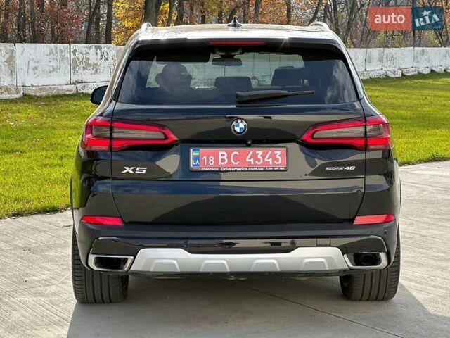 Черный БМВ Х5, объемом двигателя 3 л и пробегом 106 тыс. км за 39000 $, фото 4 на Automoto.ua