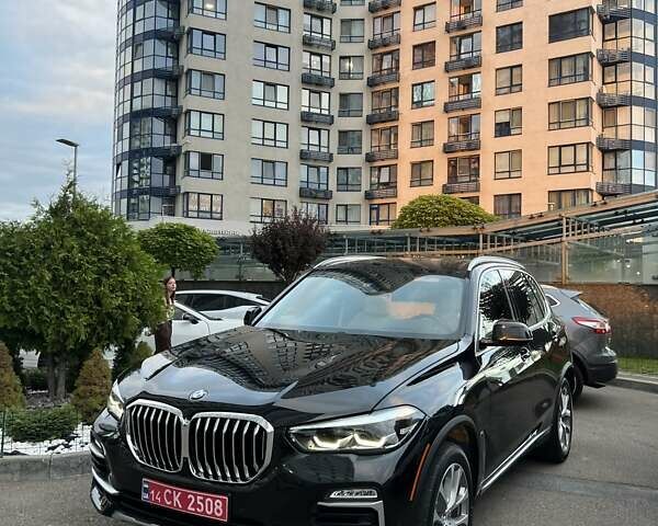 Черный БМВ Х5, объемом двигателя 3 л и пробегом 104 тыс. км за 40500 $, фото 1 на Automoto.ua