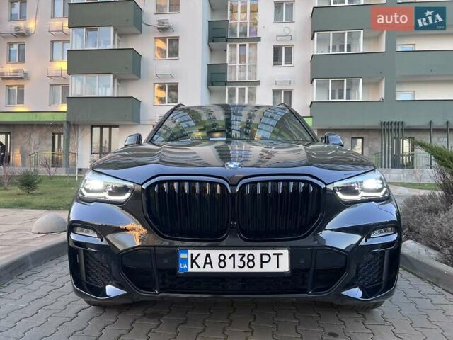 Черный БМВ Х5, объемом двигателя 3 л и пробегом 58 тыс. км за 64500 $, фото 1 на Automoto.ua