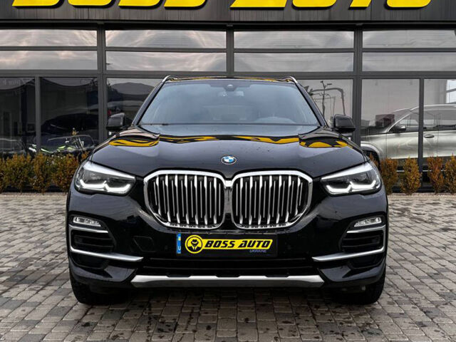 Черный БМВ Х5, объемом двигателя 3 л и пробегом 35 тыс. км за 56900 $, фото 1 на Automoto.ua