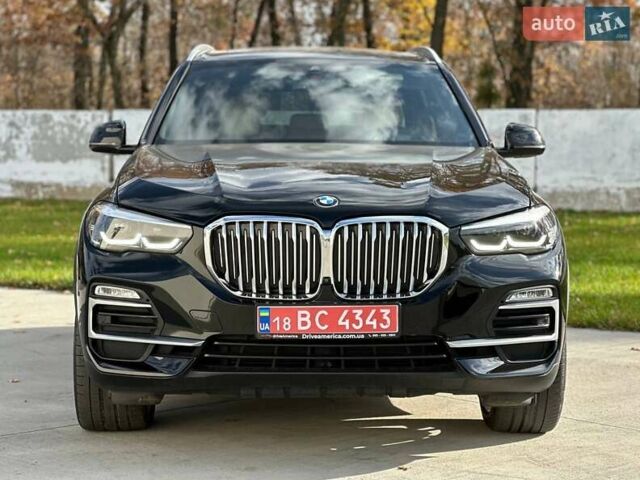 Черный БМВ Х5, объемом двигателя 3 л и пробегом 106 тыс. км за 38200 $, фото 2 на Automoto.ua