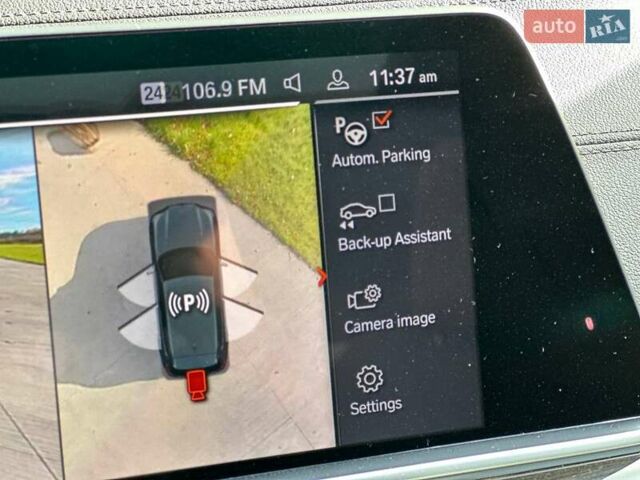 Черный БМВ Х5, объемом двигателя 3 л и пробегом 106 тыс. км за 39000 $, фото 26 на Automoto.ua