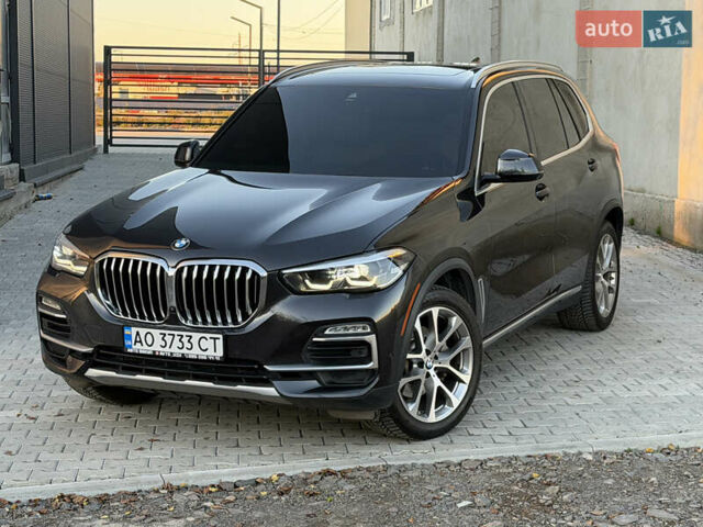 Черный БМВ Х5, объемом двигателя 3 л и пробегом 155 тыс. км за 40000 $, фото 1 на Automoto.ua