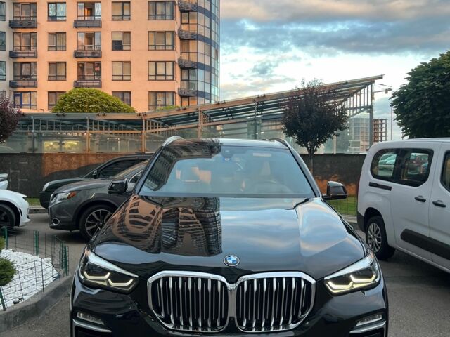 Черный БМВ Х5, объемом двигателя 3 л и пробегом 105 тыс. км за 41000 $, фото 1 на Automoto.ua