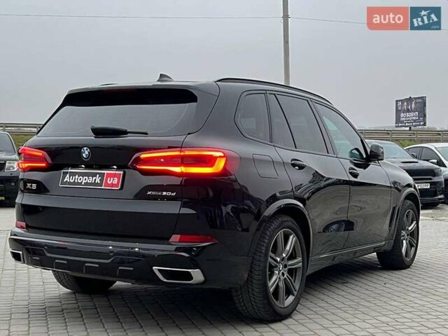 Черный БМВ Х5, объемом двигателя 3 л и пробегом 82 тыс. км за 66490 $, фото 6 на Automoto.ua