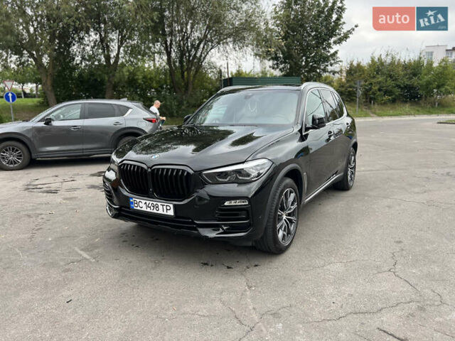 Чорний БМВ Х5, об'ємом двигуна 3 л та пробігом 141 тис. км за 41700 $, фото 4 на Automoto.ua
