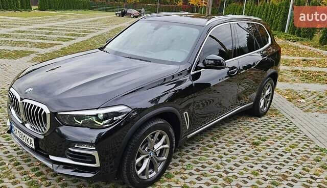 Черный БМВ Х5, объемом двигателя 2 л и пробегом 74 тыс. км за 53000 $, фото 2 на Automoto.ua