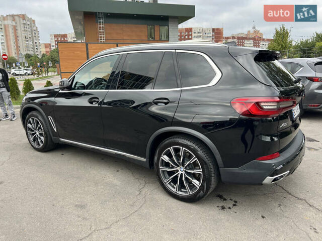 Чорний БМВ Х5, об'ємом двигуна 3 л та пробігом 141 тис. км за 41700 $, фото 2 на Automoto.ua