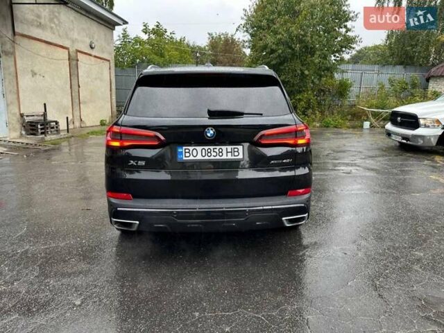 Черный БМВ Х5, объемом двигателя 3 л и пробегом 74 тыс. км за 57500 $, фото 4 на Automoto.ua