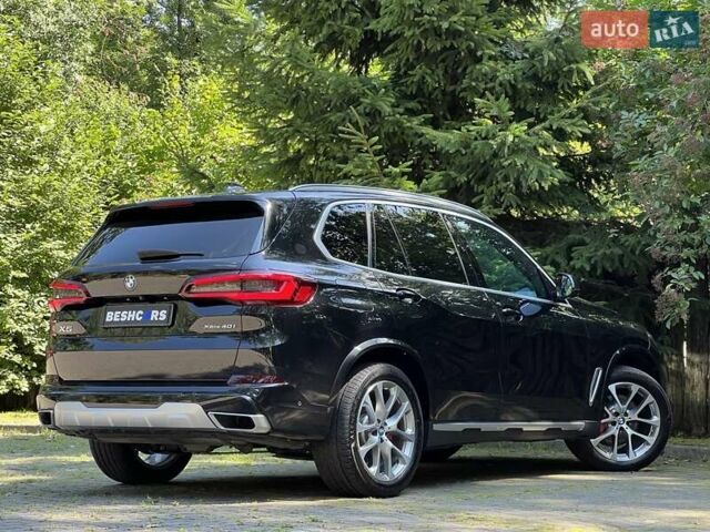 Черный БМВ Х5, объемом двигателя 3 л и пробегом 39 тыс. км за 56990 $, фото 4 на Automoto.ua