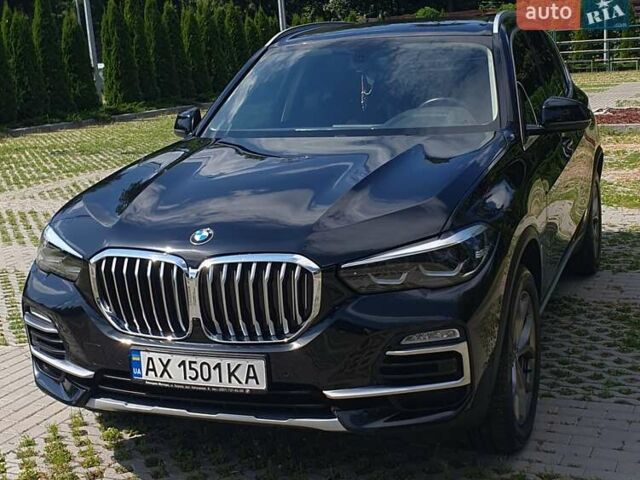 Черный БМВ Х5, объемом двигателя 2 л и пробегом 73 тыс. км за 53800 $, фото 1 на Automoto.ua