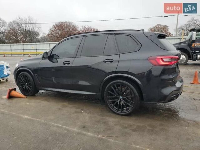 Черный БМВ Х5, объемом двигателя 3 л и пробегом 77 тыс. км за 23000 $, фото 1 на Automoto.ua