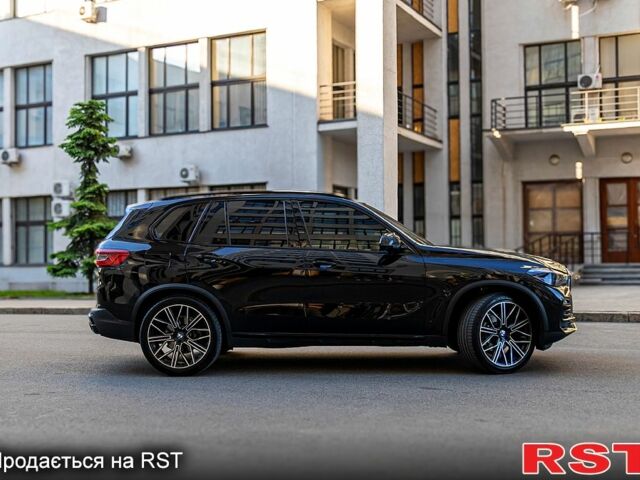 Черный БМВ Х5, объемом двигателя 3 л и пробегом 87 тыс. км за 53900 $, фото 2 на Automoto.ua