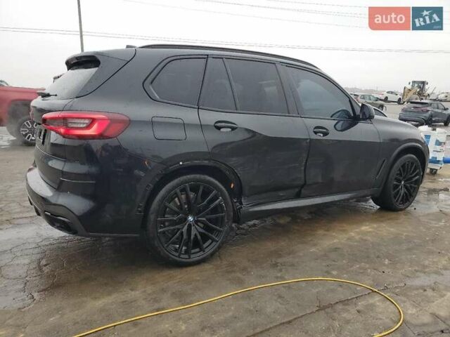 Черный БМВ Х5, объемом двигателя 3 л и пробегом 77 тыс. км за 23000 $, фото 2 на Automoto.ua