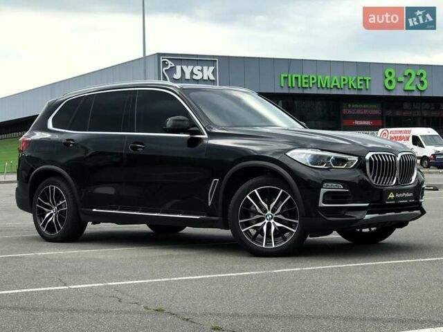 Чорний БМВ Х5, об'ємом двигуна 3 л та пробігом 219 тис. км за 53500 $, фото 2 на Automoto.ua