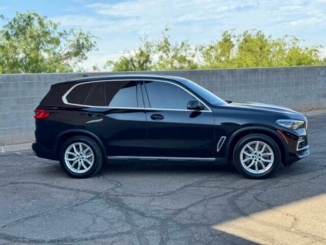 Черный БМВ Х5, объемом двигателя 3 л и пробегом 30 тыс. км за 17000 $, фото 1 на Automoto.ua