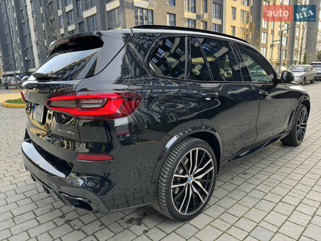 Черный БМВ Х5, объемом двигателя 3 л и пробегом 60 тыс. км за 61900 $, фото 3 на Automoto.ua