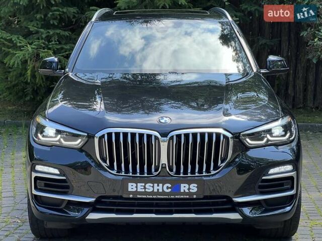 Черный БМВ Х5, объемом двигателя 3 л и пробегом 39 тыс. км за 56990 $, фото 1 на Automoto.ua