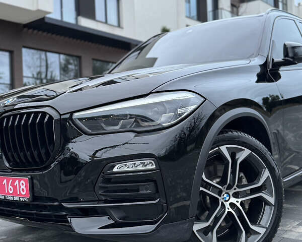 Чорний БМВ Х5, об'ємом двигуна 3 л та пробігом 147 тис. км за 41500 $, фото 2 на Automoto.ua