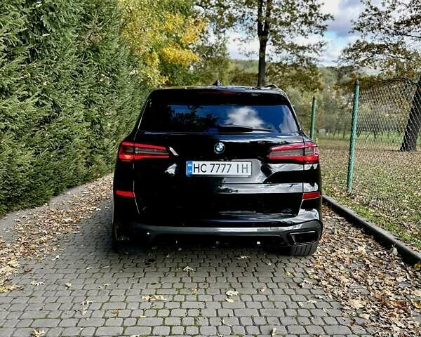 Черный БМВ Х5, объемом двигателя 3 л и пробегом 43 тыс. км за 74000 $, фото 4 на Automoto.ua