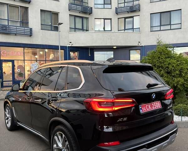 Черный БМВ Х5, объемом двигателя 3 л и пробегом 104 тыс. км за 43500 $, фото 2 на Automoto.ua
