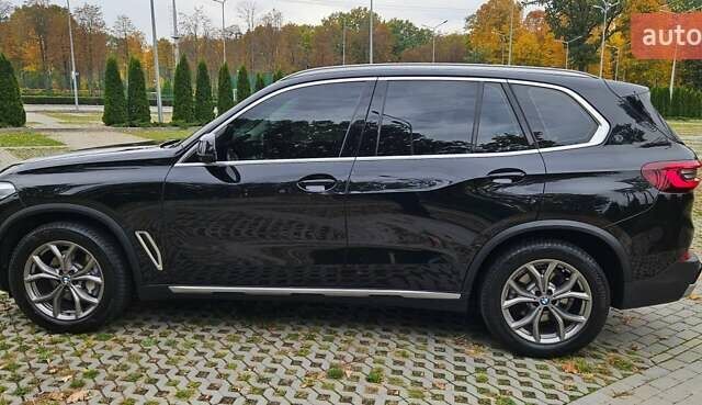 Черный БМВ Х5, объемом двигателя 2 л и пробегом 74 тыс. км за 53000 $, фото 1 на Automoto.ua