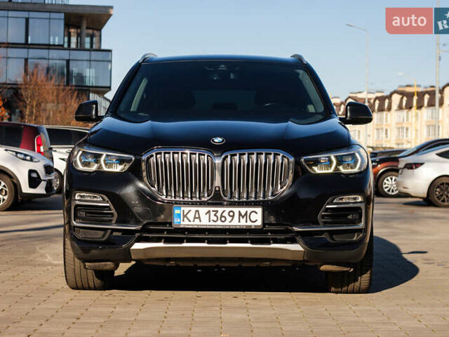 Чорний БМВ Х5, об'ємом двигуна 3 л та пробігом 183 тис. км за 58800 $, фото 4 на Automoto.ua