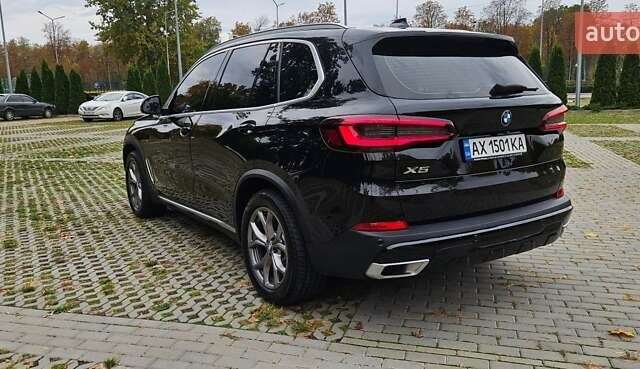 Черный БМВ Х5, объемом двигателя 2 л и пробегом 74 тыс. км за 53000 $, фото 4 на Automoto.ua