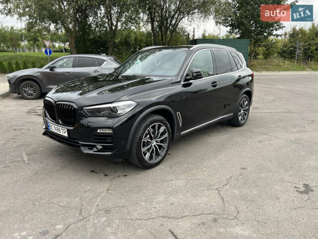 Чорний БМВ Х5, об'ємом двигуна 3 л та пробігом 141 тис. км за 41700 $, фото 1 на Automoto.ua