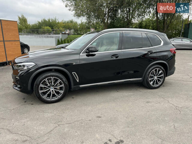 Чорний БМВ Х5, об'ємом двигуна 3 л та пробігом 141 тис. км за 41700 $, фото 3 на Automoto.ua