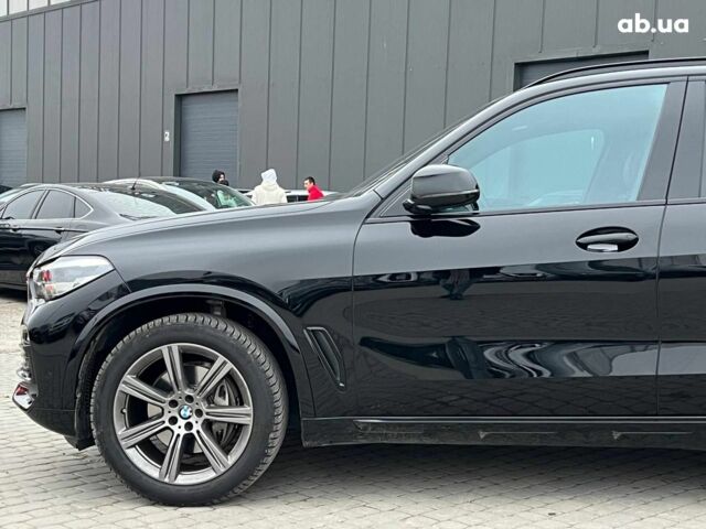 Черный БМВ Х5, объемом двигателя 3 л и пробегом 82 тыс. км за 66440 $, фото 1 на Automoto.ua