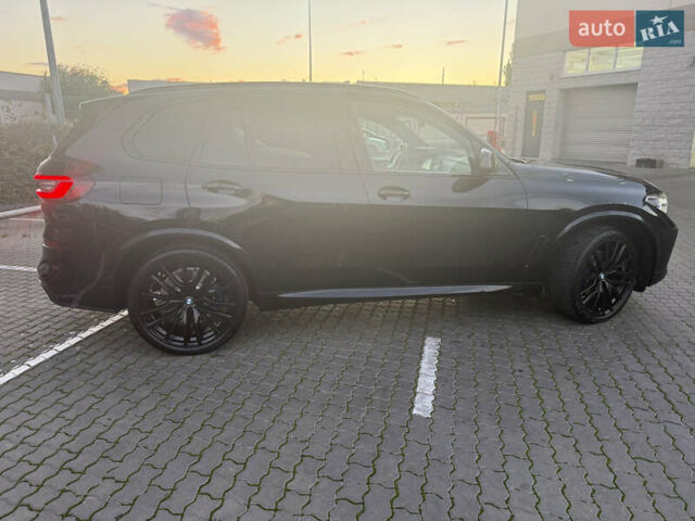 Чорний БМВ Х5, об'ємом двигуна 3 л та пробігом 98 тис. км за 59000 $, фото 1 на Automoto.ua