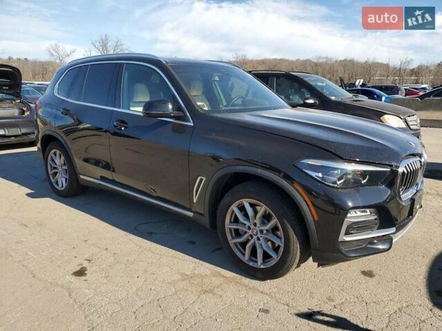 Чорний БМВ Х5, об'ємом двигуна 3 л та пробігом 90 тис. км за 25000 $, фото 3 на Automoto.ua