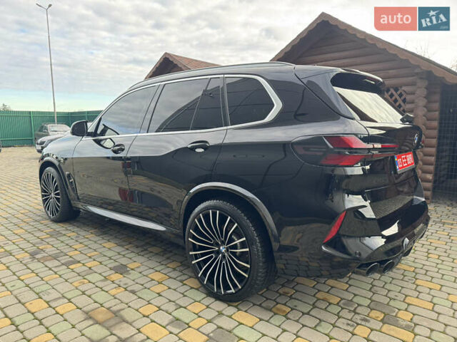 Черный БМВ Х5, объемом двигателя 3 л и пробегом 74 тыс. км за 56000 $, фото 5 на Automoto.ua