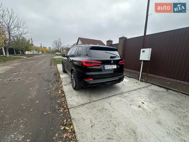 Черный БМВ Х5, объемом двигателя 2 л и пробегом 106 тыс. км за 59999 $, фото 12 на Automoto.ua