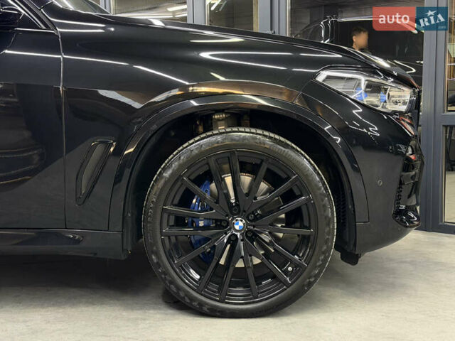 Чорний БМВ Х5, об'ємом двигуна 3 л та пробігом 98 тис. км за 58000 $, фото 4 на Automoto.ua