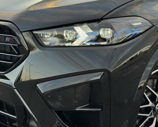 Чорний БМВ Х5, об'ємом двигуна 3 л та пробігом 100 тис. км за 62999 $, фото 2 на Automoto.ua